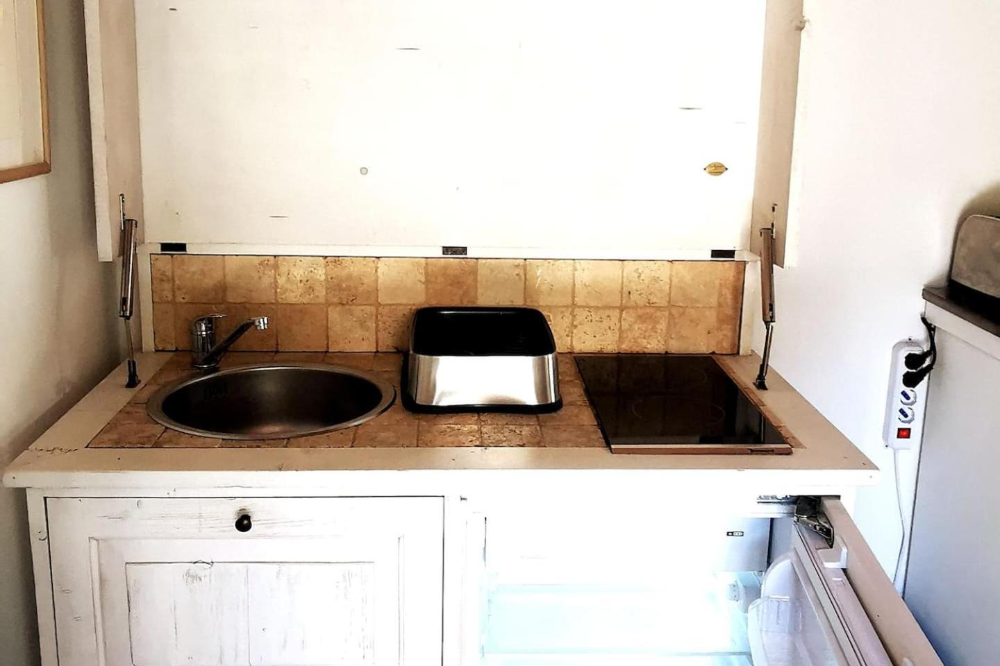 La Camelia D'Oro Apartment ออกเจบบิโอ ภายนอก รูปภาพ